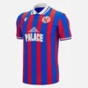 Crystal Palace 2025/26 Vintage-Hemd für Erwachsene (Limited Edition) Crystal Palace 2025/26 Vintage-Hemd für Erwachsene (Limited Edition)
